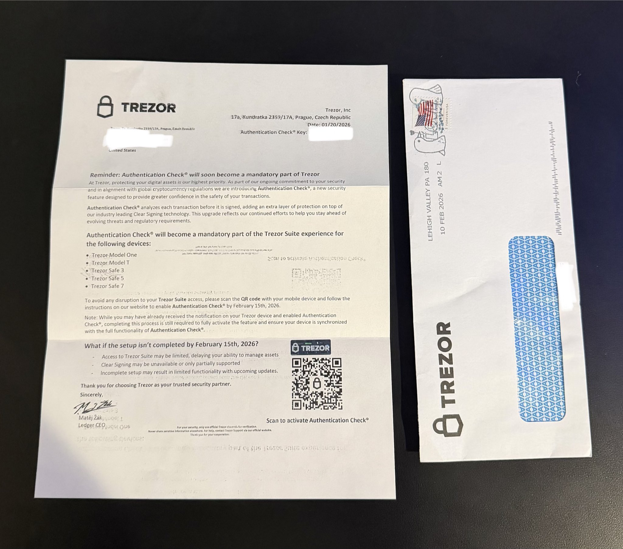 photograph of a physical letter sent to Trezor users as part of a phishing campaign